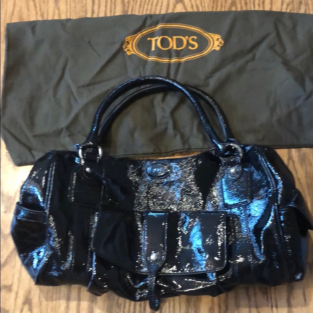 Authentic Tod’s Black Paten Leather purse